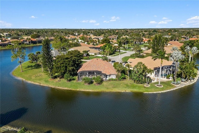 bird's eye view with a residential view and a water view