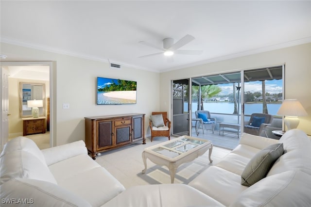 living room featuring ornamental molding and ceiling fan