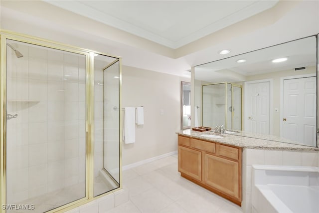 bathroom featuring ornamental molding, separate shower and tub, vanity, and tile patterned floors