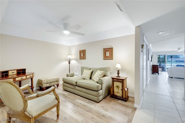 living room with ceiling fan