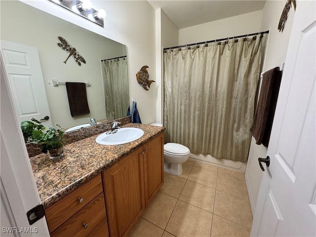 full bathroom featuring tile patterned flooring, vanity, and toilet