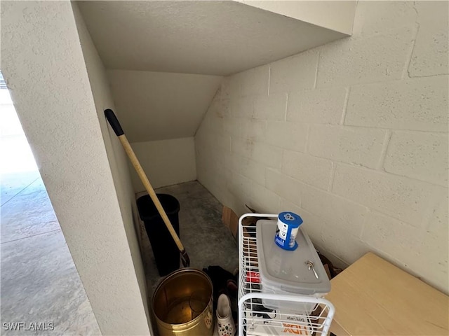 interior space featuring concrete block wall