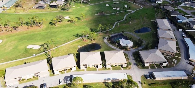 bird's eye view featuring view of golf course and a residential view