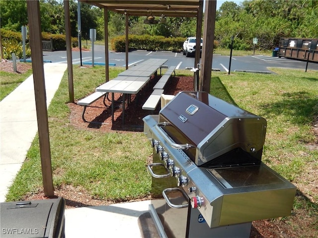 view of storm shelter with a lawn