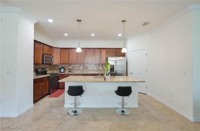 kitchen featuring a breakfast bar area, light stone counters, a center island with sink, appliances with stainless steel finishes, and pendant lighting