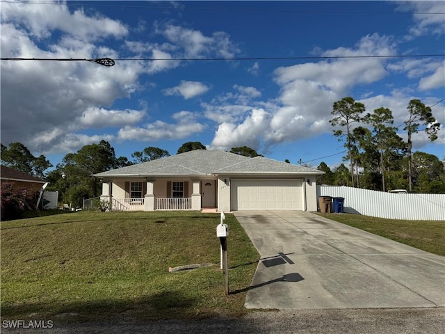 ranch-style house with a garage, a front yard, concrete driveway, and stucco siding