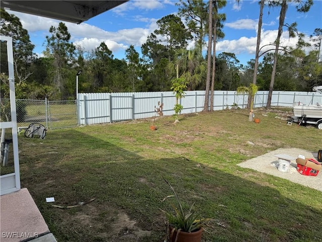 view of yard featuring a fenced backyard