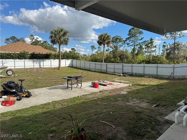 exterior space featuring a patio area and a fenced backyard