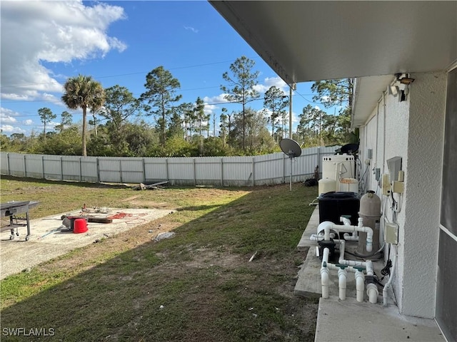 view of yard with a fenced backyard