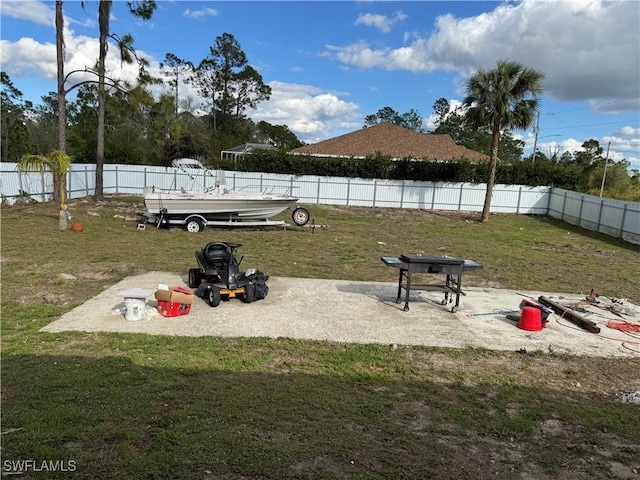 view of yard with a fenced backyard