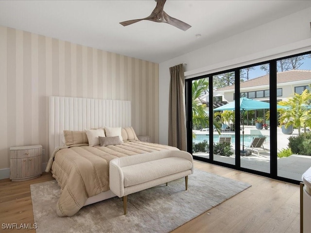 bedroom with light wood-type flooring, access to exterior, and ceiling fan