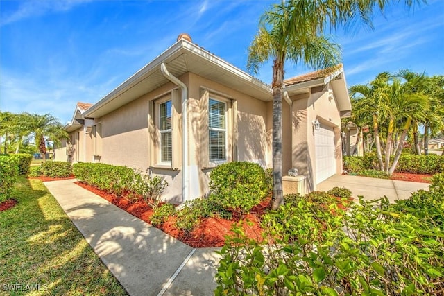 view of home's exterior featuring a garage