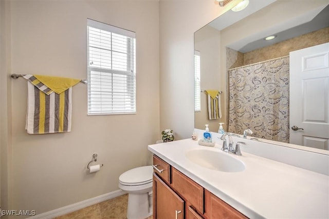 bathroom with walk in shower, vanity, toilet, and tile patterned flooring