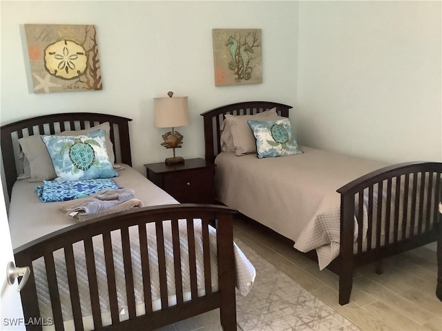 bedroom featuring light hardwood / wood-style floors