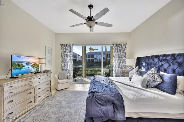 tiled bedroom with access to exterior and ceiling fan