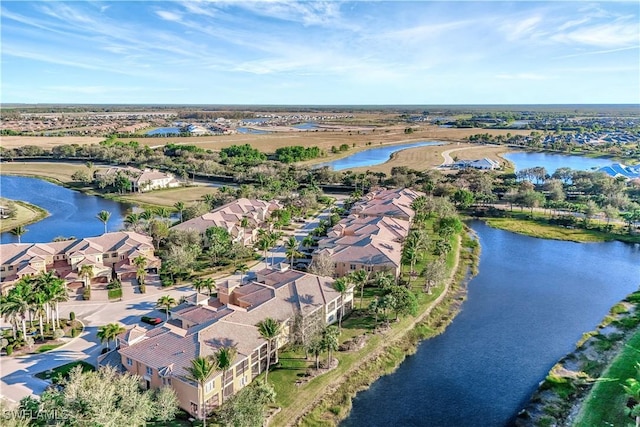 drone / aerial view with a water view