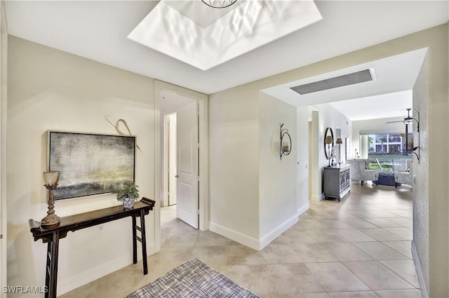 hallway with light tile patterned floors