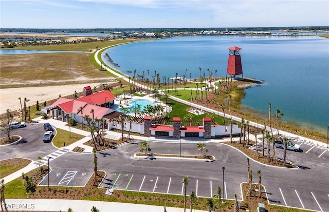 drone / aerial view featuring a water view