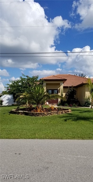 view of front of house with a front yard