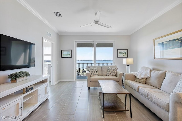 43010 Greenway Blvd Unit 244, Punta Gorda, FL 33982 - living room featuring a ceiling fan, ornamental molding, and baseboards