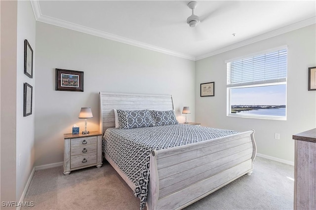 bedroom featuring crown molding, light carpet, and ceiling fan