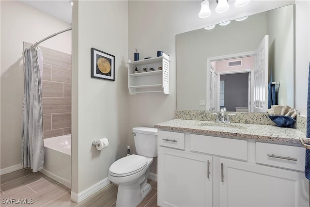 full bathroom with vanity, shower / bath combination with curtain, and toilet