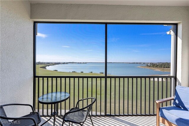 43010 Greenway Blvd Unit 244, Punta Gorda, FL 33982 - sunroom / solarium with a water view