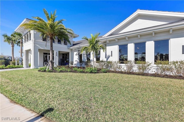 view of front of home with a front yard