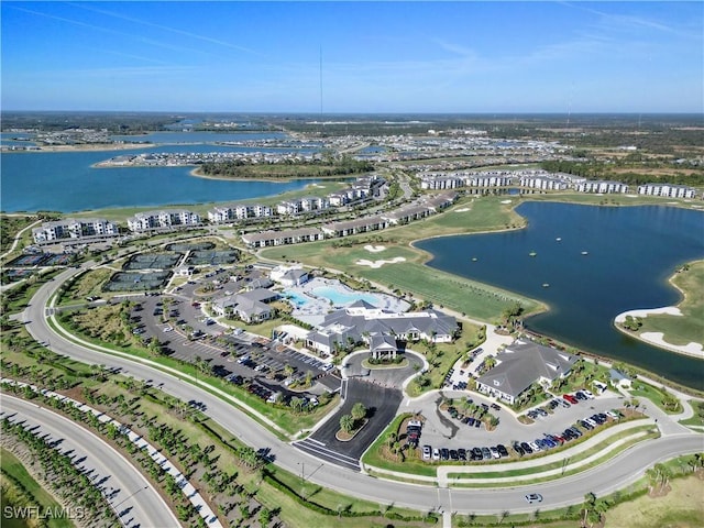 drone / aerial view with a water view