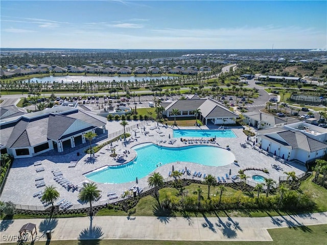 bird's eye view with a water view