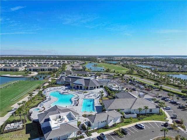 bird's eye view with a water view