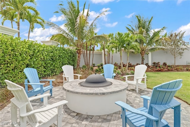 view of patio / terrace with a fire pit