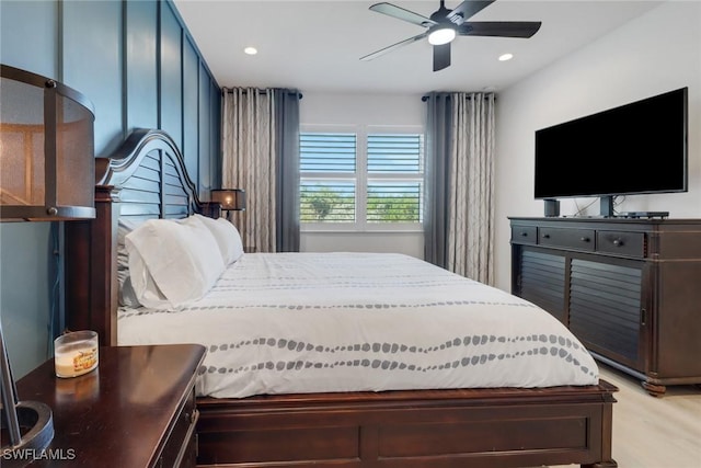 bedroom featuring ceiling fan and light hardwood / wood-style floors