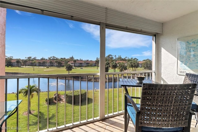 sunroom with a water view