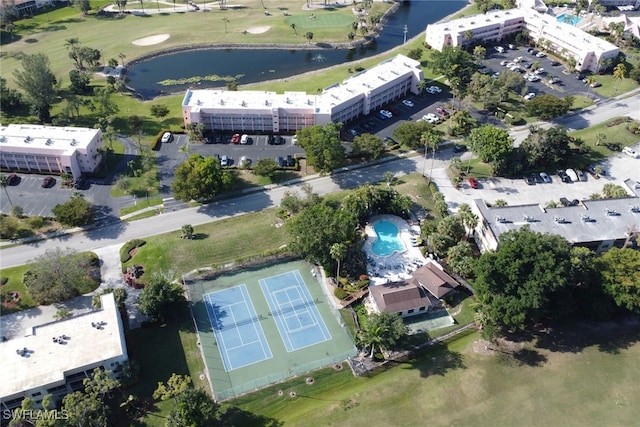 drone / aerial view with a water view