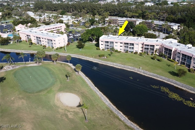 bird's eye view featuring a water view and golf course view