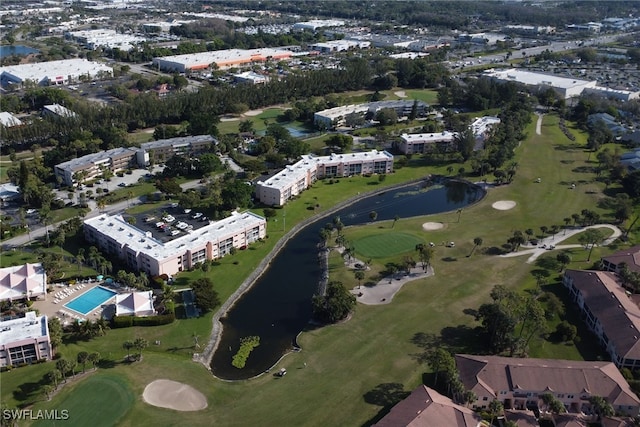 bird's eye view with golf course view and a water view