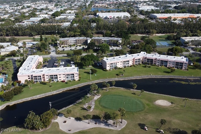 aerial view with view of golf course and a water view