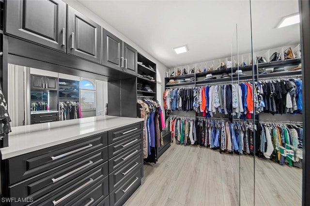 walk in closet featuring light wood-type flooring