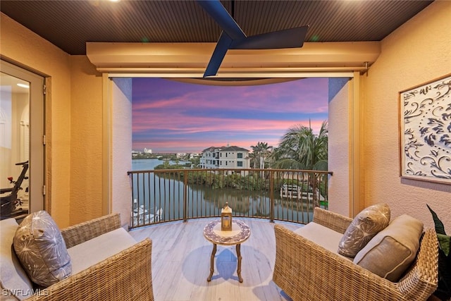 balcony at dusk with a water view