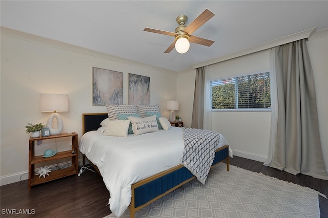 bedroom with hardwood / wood-style floors and ceiling fan