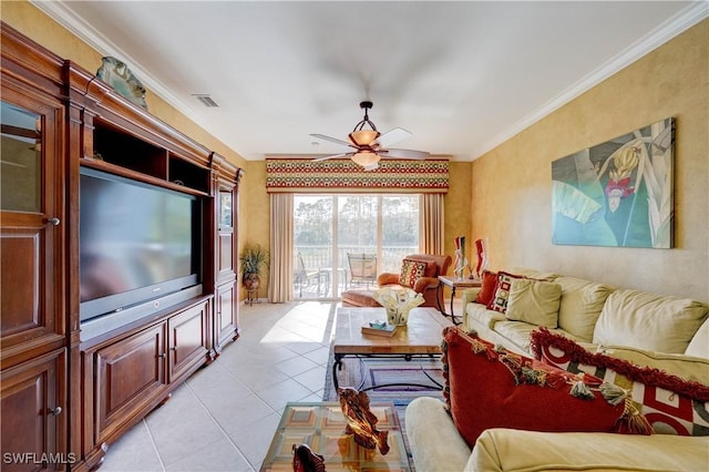 tiled living room featuring ornamental molding and ceiling fan