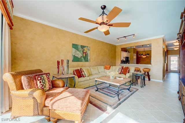 tiled living room with crown molding, ceiling fan, and rail lighting