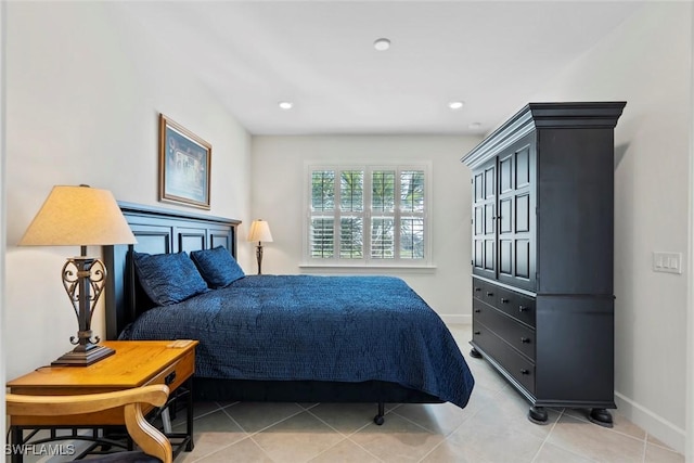 bedroom with light tile patterned flooring