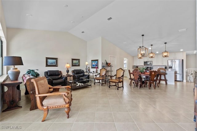 tiled living room featuring vaulted ceiling