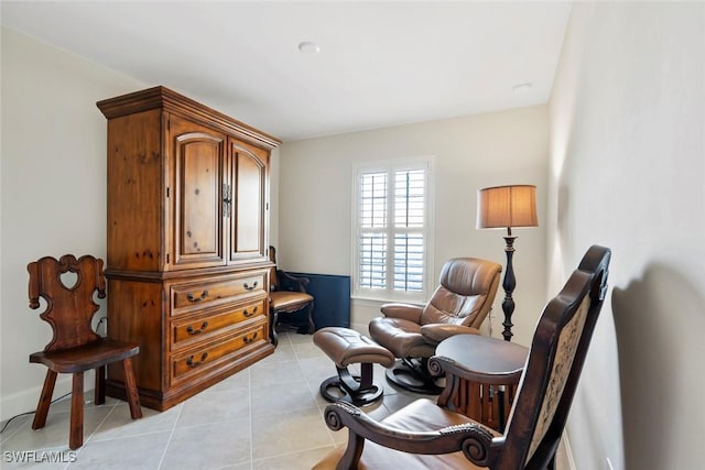 living area with light tile patterned floors