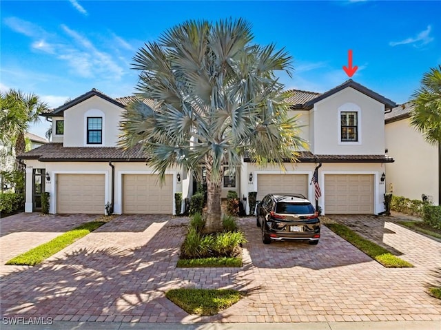 view of front of property featuring a garage