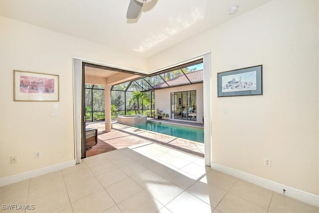 view of swimming pool featuring ceiling fan