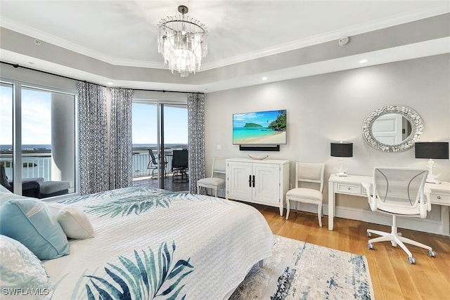 4931 Bonita Bay Blvd Unit 2103, Bonita Springs, FL 34134 - bedroom with access to outside, wood finished floors, a chandelier, crown molding, and recessed lighting