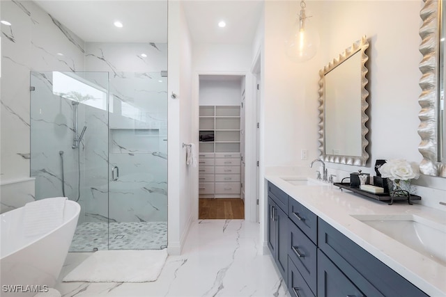 bathroom featuring vanity and plus walk in shower